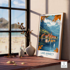 Lake Annecy Travel Poster France displayed in a bright room with a view of the lake and mountains in the background.