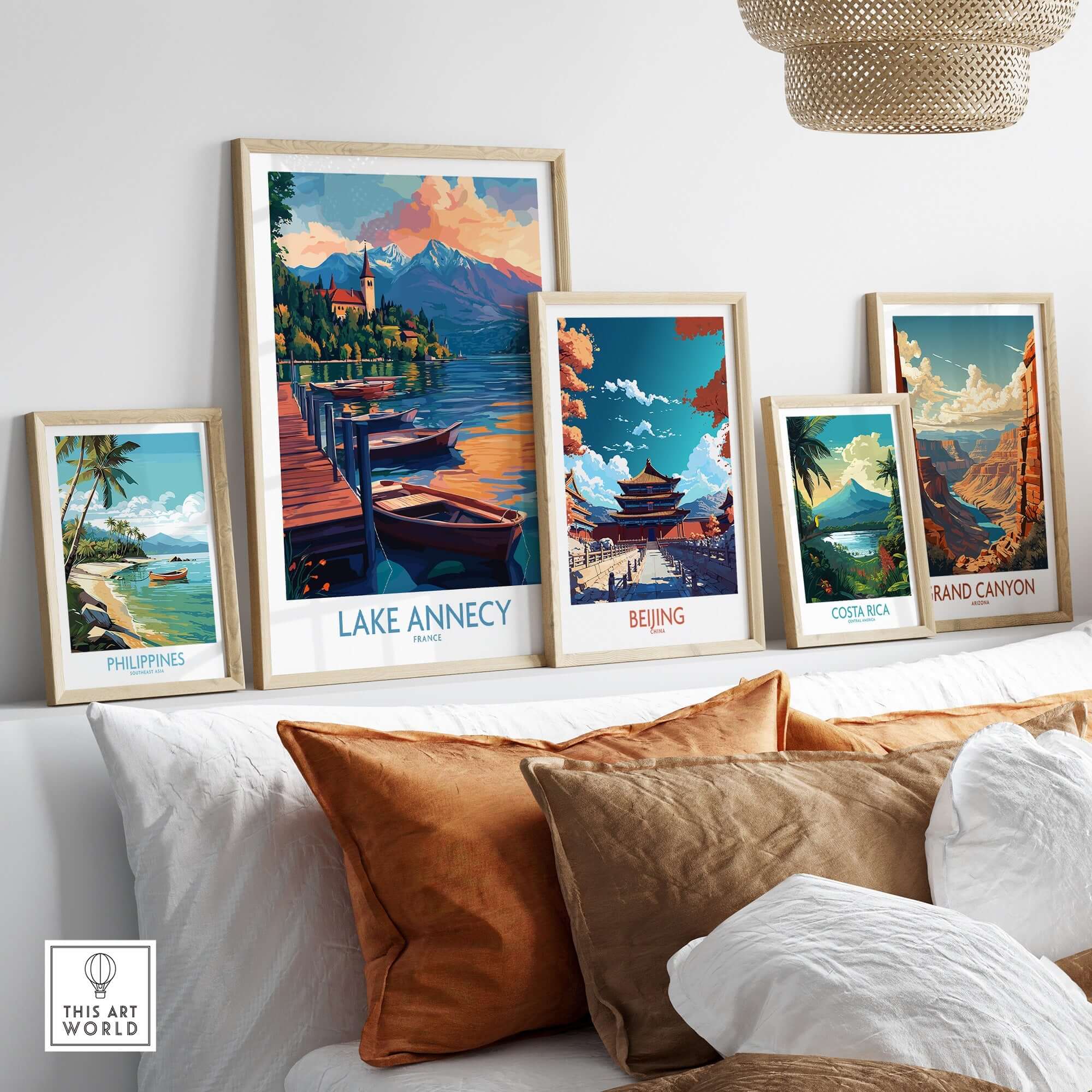 Lake Annecy Wall Art Print alongside other travel-inspired prints in a stylish home setting.