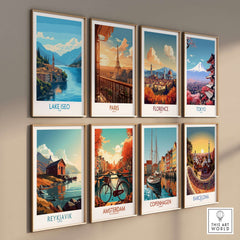 Lake Iseo Travel Poster and other city travel art prints framed on a wall in a stylish display.