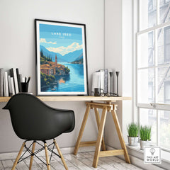 Lake Iseo Travel Print displayed in a stylish office setting, showcasing vibrant colors and serene waters.
