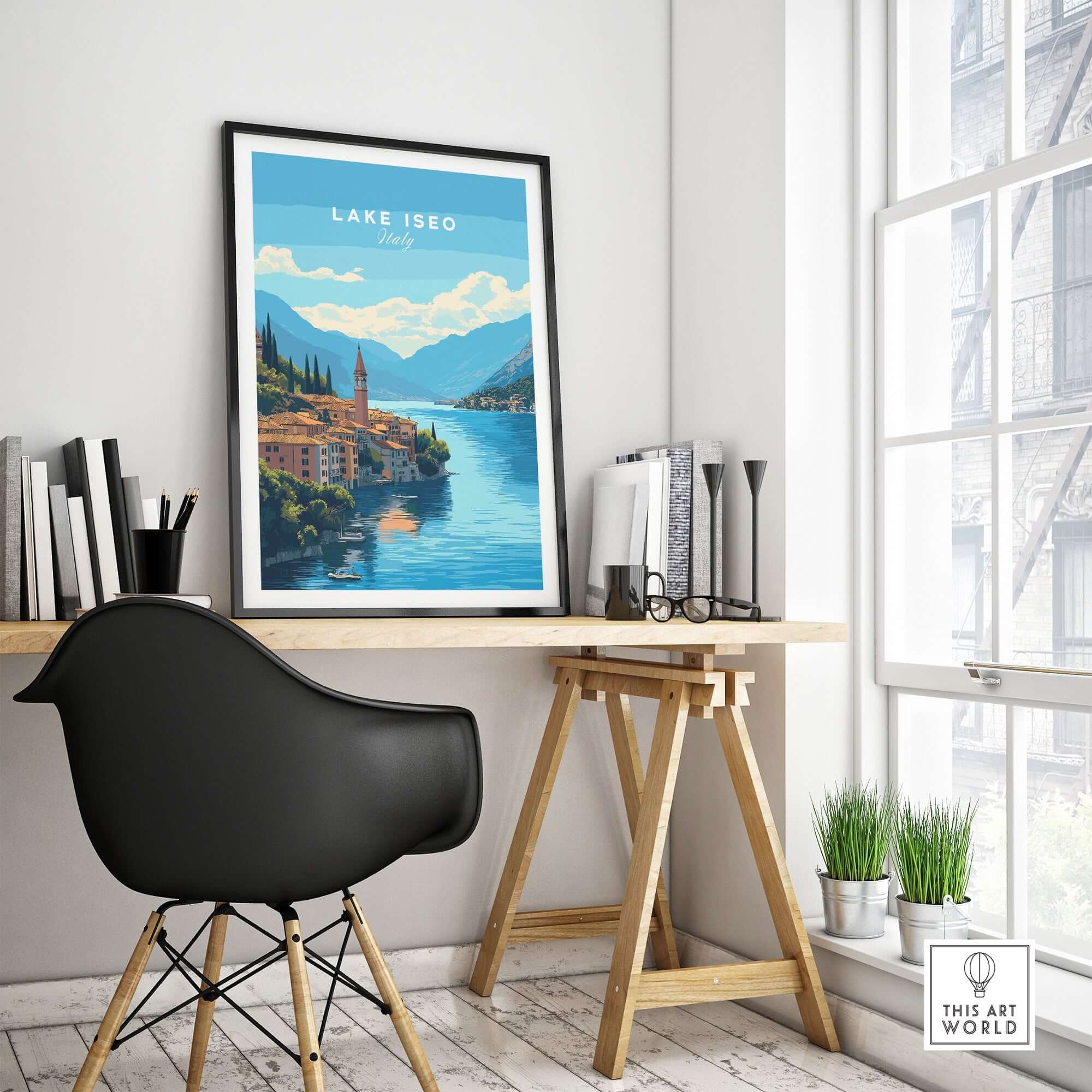 Lake Iseo Travel Print displayed in a stylish office setting, showcasing vibrant colors and serene waters.