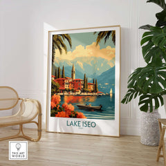 Lake Iseo Wall Art Print featuring a serene lakeside view with mountains, flowers, and boats in a cozy living space setting.