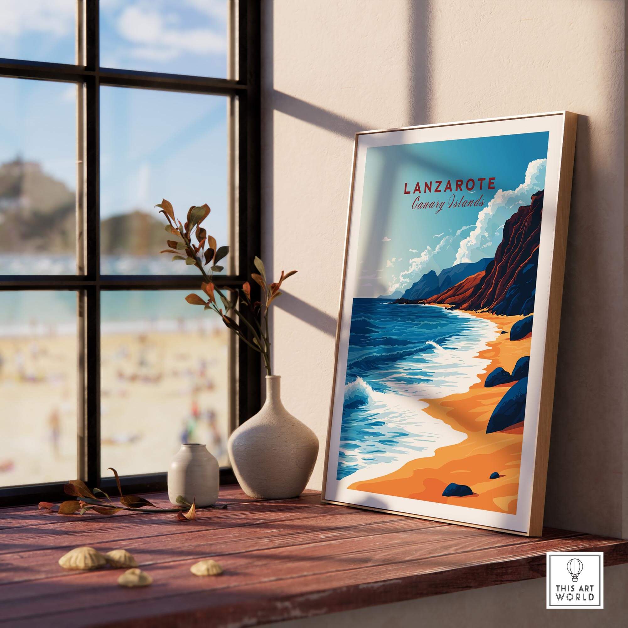 Lanzarote Canary Islands Spain Poster displayed in a cozy interior, showcasing beautiful beach and ocean scenery.