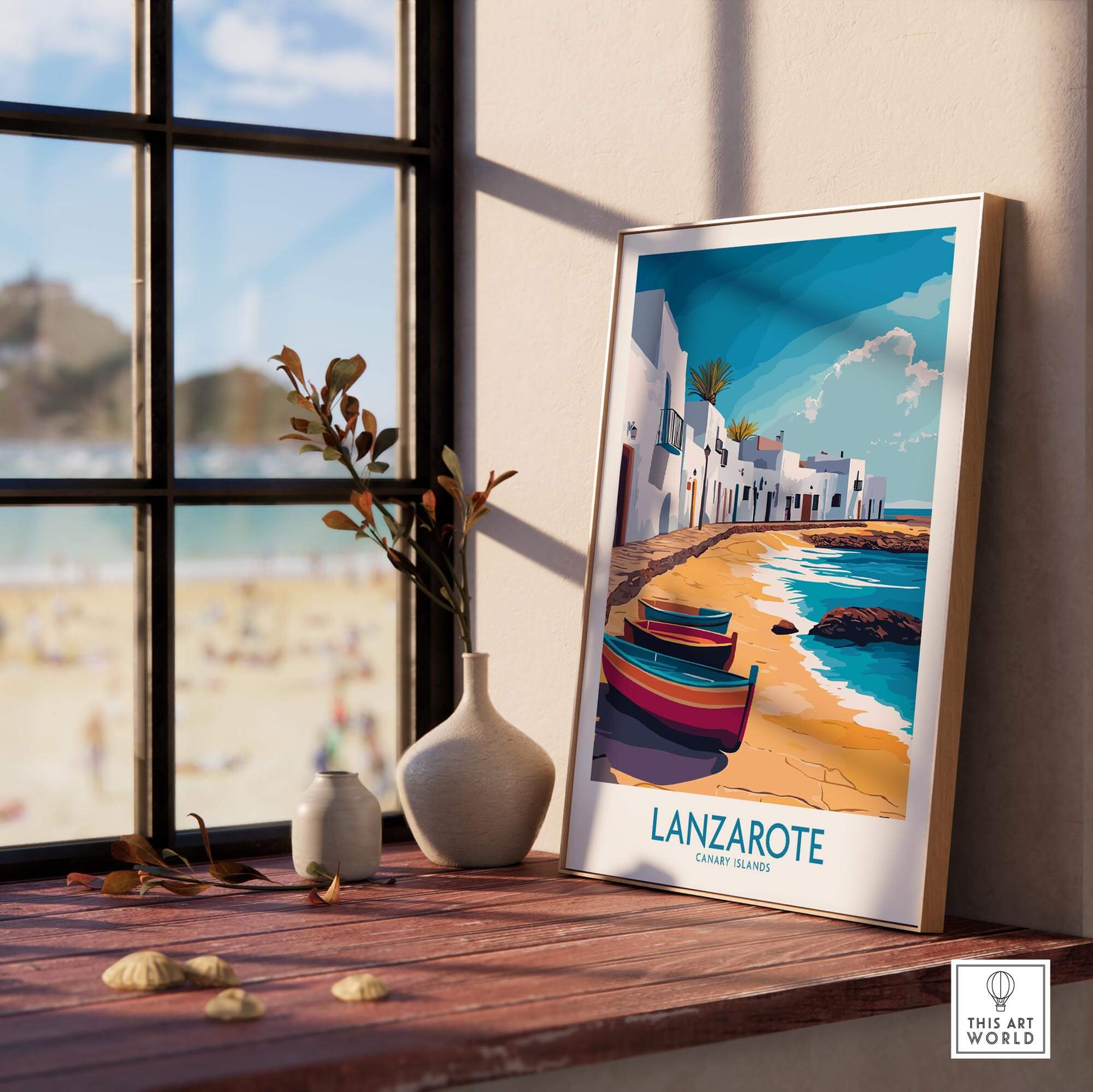 Lanzarote Canary Islands Spain Travel Poster displayed near a window with a view of the beach and colorful boats.