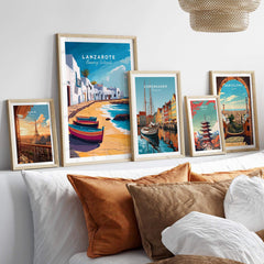 Lanzarote Canary Islands Spain Travel Print displayed among various travel prints on a cozy bed.