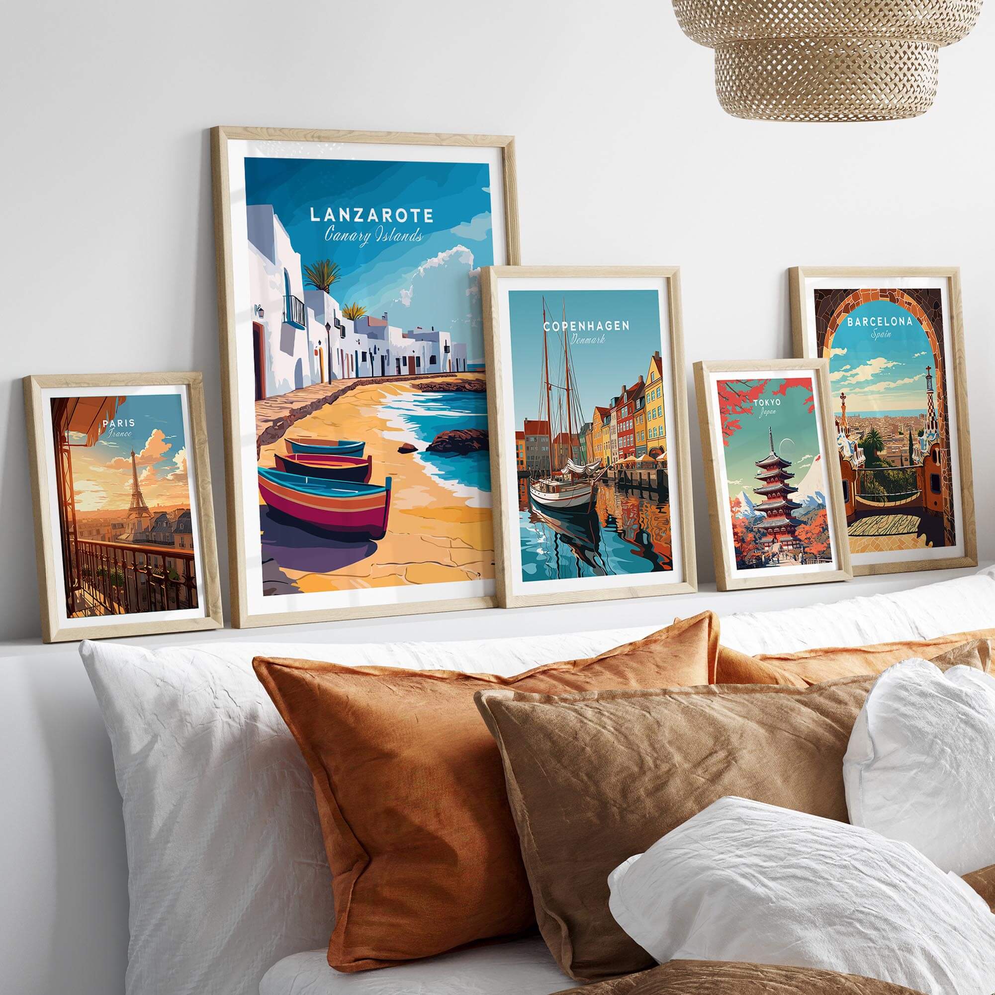 Lanzarote Canary Islands Spain Travel Print displayed among various travel prints on a cozy bed.