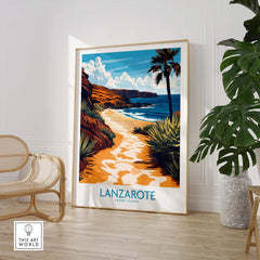 Lanzarote Canary Islands Spain Wall Art Print showcasing a serene beach scene with palm trees and rocky cliffs.