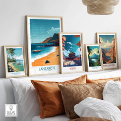 Lanzarote Wall Art Print displayed among travel posters, showcasing beautiful beach landscape and serene decor.