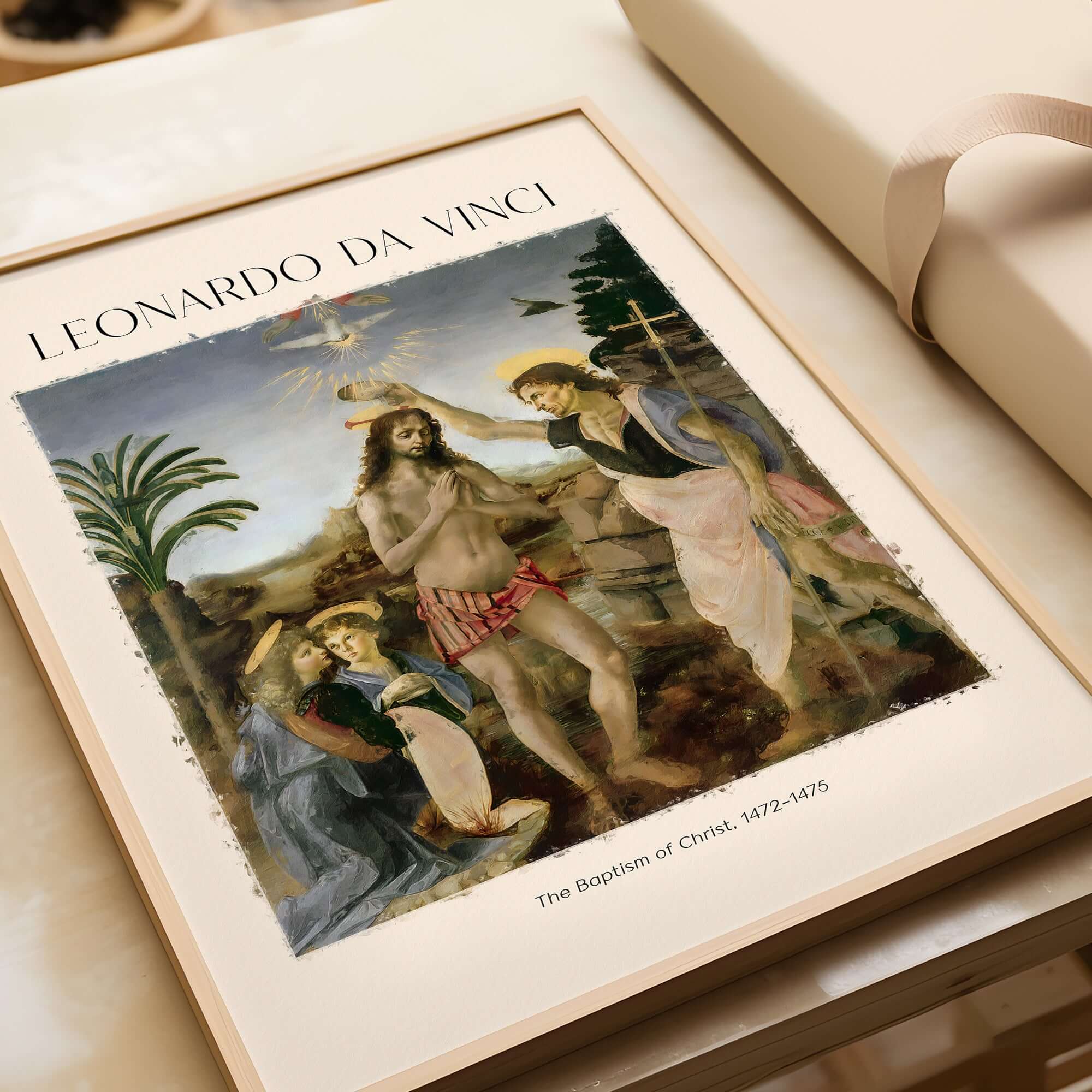 Leonardo da Vinci Art Print The Baptism of Christ 1470s displayed in a wooden frame with a light background.