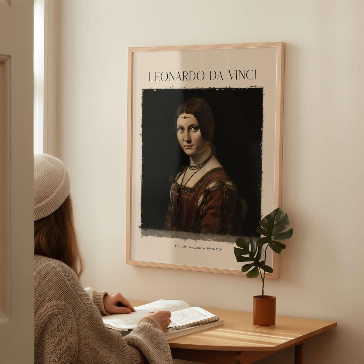 Leonardo da Vinci La Belle Ferronnière 1490s Renaissance Portrait Art Print displayed on wall with viewer studying.