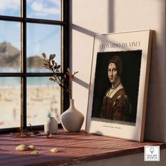 Leonardo da Vinci La Belle Ferronnière 1490s Renaissance Portrait Art Print displayed on a sunlit table near a window.