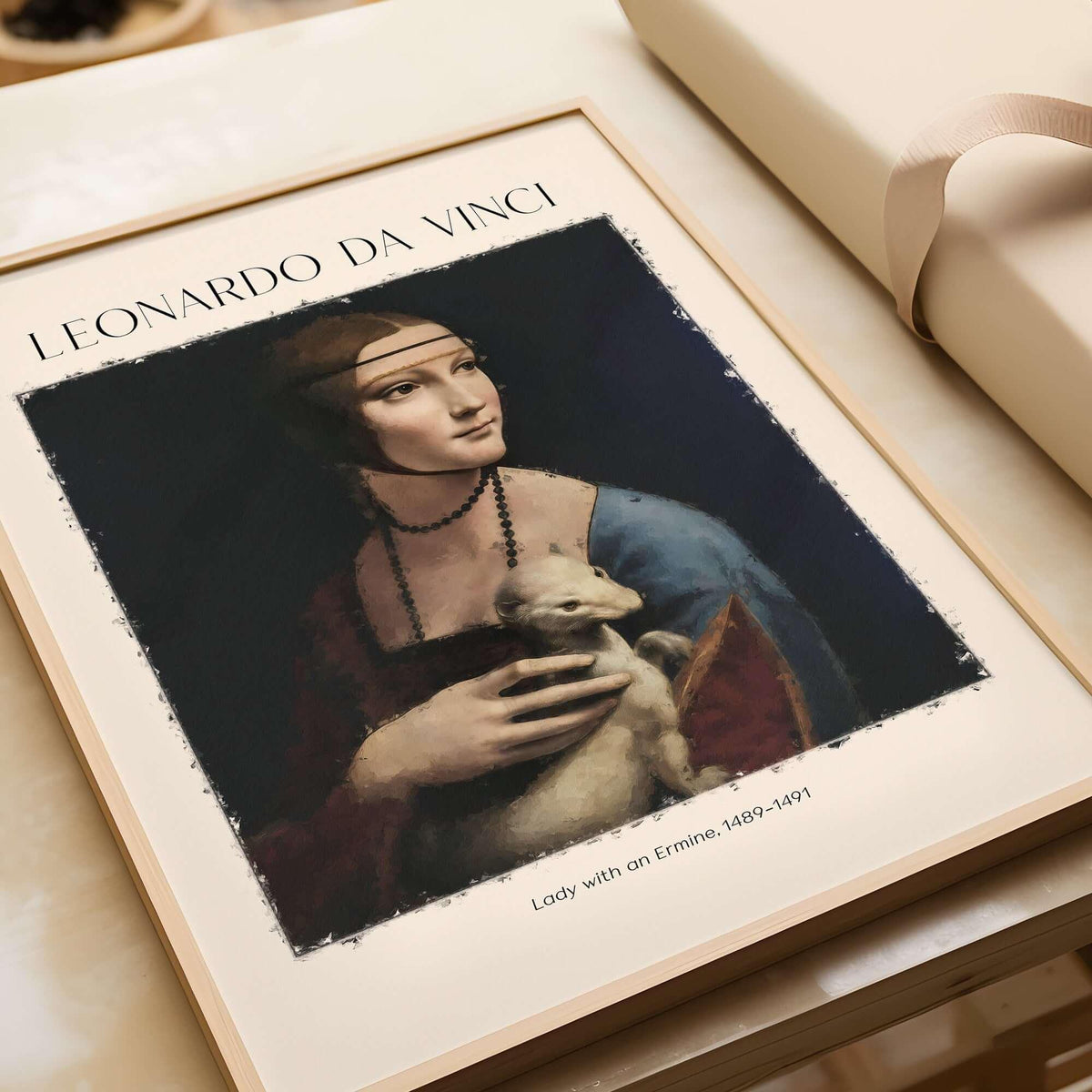 Leonardo da Vinci Art Print - Lady with an Ermine 1490 Cecilia Gallerani Portrait Art Print displayed on a table.