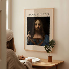 Leonardo da Vinci Salvator Mundi c1500 Portrait of Christ Art Print Poster displayed on wall above a person studying.