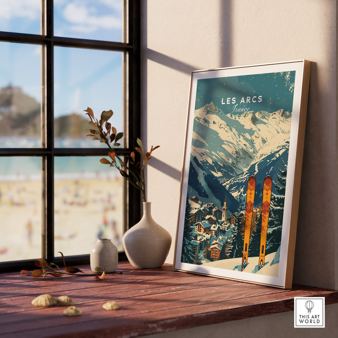 Vintage Les Arcs Ski Poster of France displayed on a wooden shelf, featuring snow-capped mountains and ski village scenery.