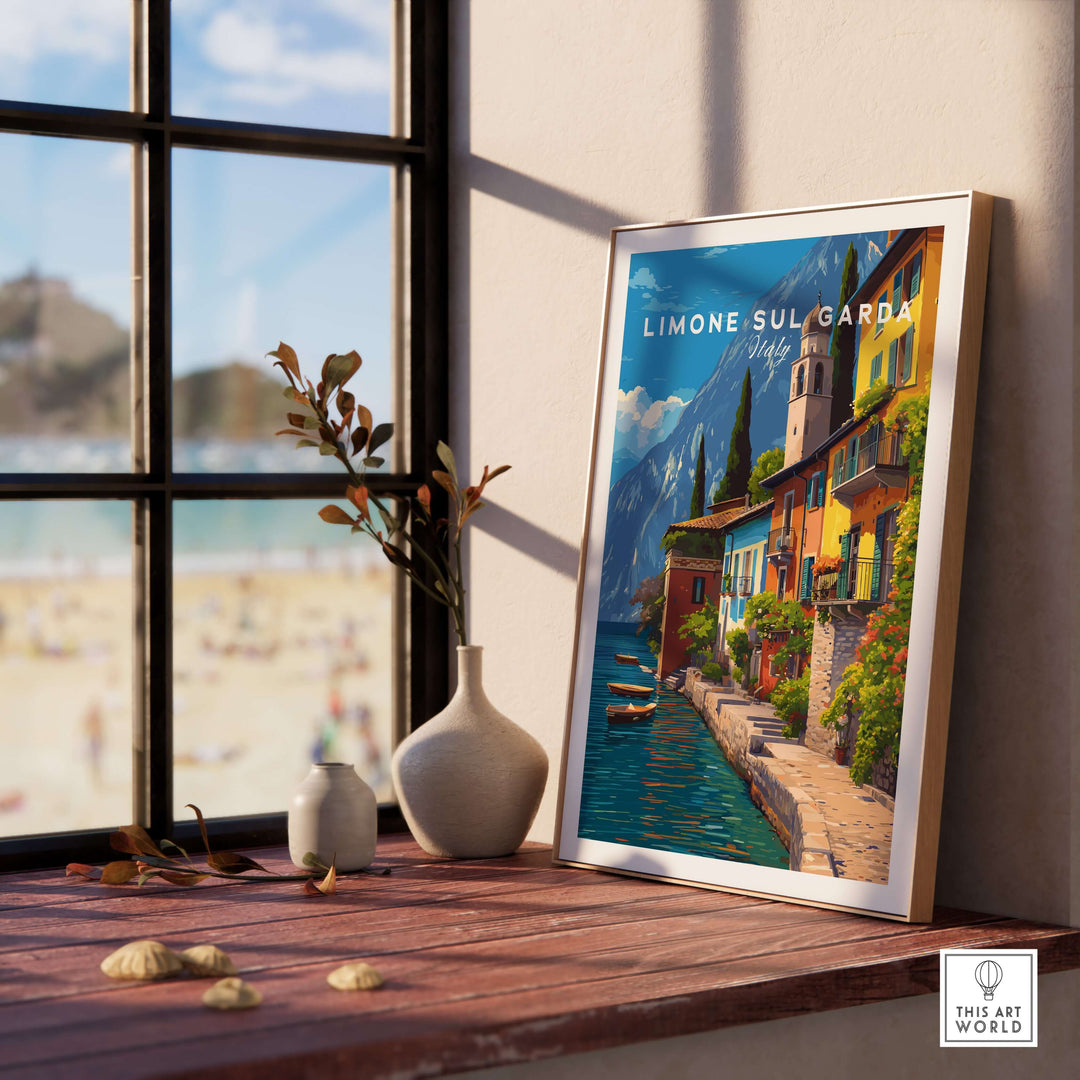 Limone sul Garda Print | Lake Garda Wall Decor displayed on a wooden table next to a vase and window view.
