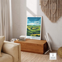 Lincolnshire Wolds Poster displayed in a cozy living room with rolling hills and vibrant landscapes.