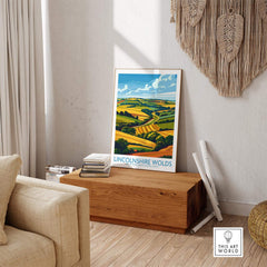 Lincolnshire Wolds Print displayed in a stylish living room, showcasing vibrant rolling hills and a serene landscape.