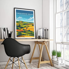 Lincolnshire Wolds Wall Art Print displayed in a modern workspace, showcasing vibrant rolling hills and scenic countryside.