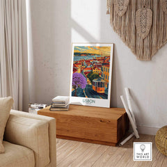 Lisbon Art Print featuring iconic Jacaranda trees and tram 28 in a cozy living space, adding charm to home decor.
