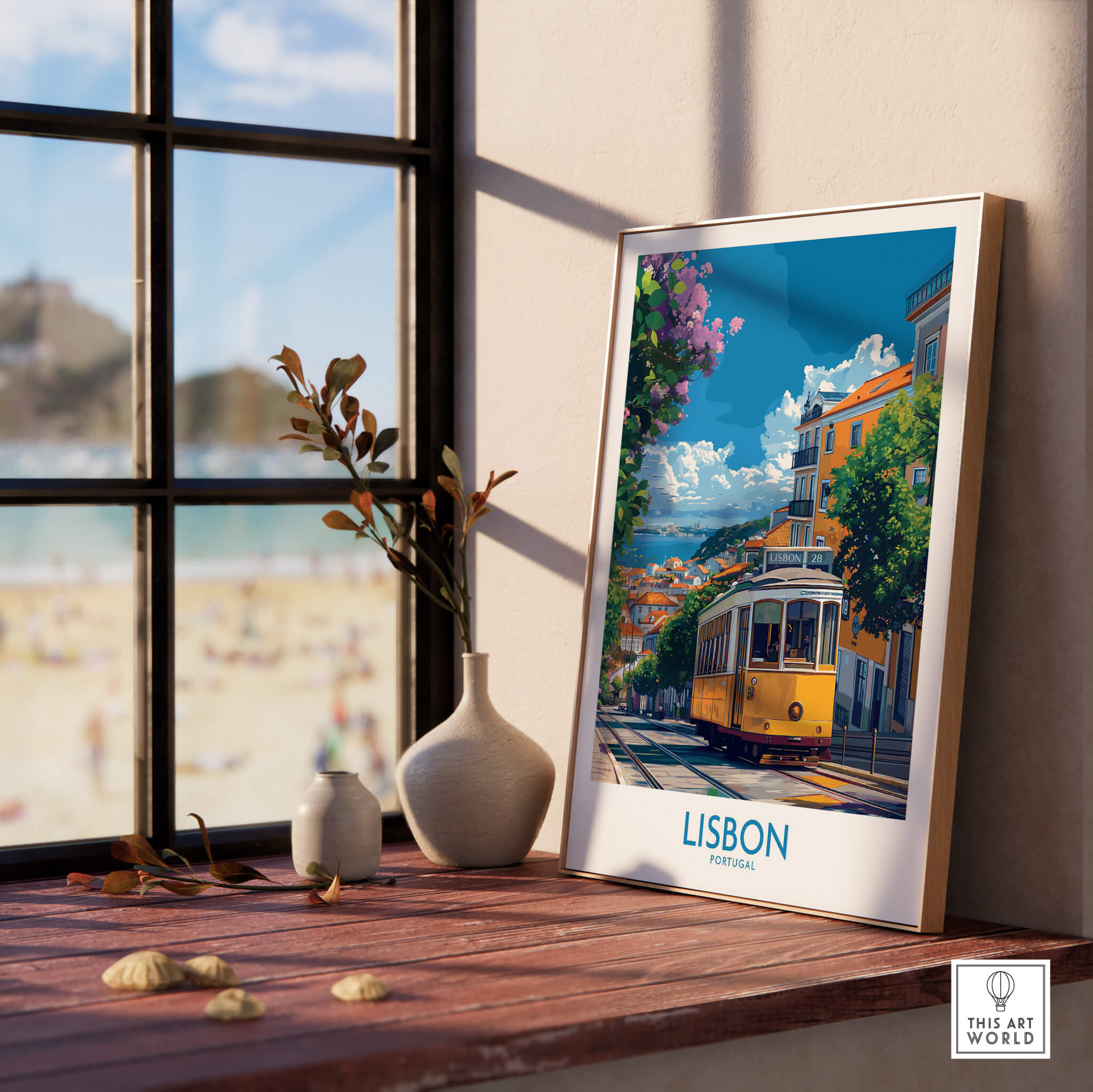 Lisbon Portugal Yellow Tram 28 Art Print | Alfama Hills Wall Decor displayed on a table by the window.
