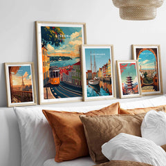 Lisbon Travel Print displayed among other city prints, showcasing vibrant colors and iconic landmarks of Lisbon.