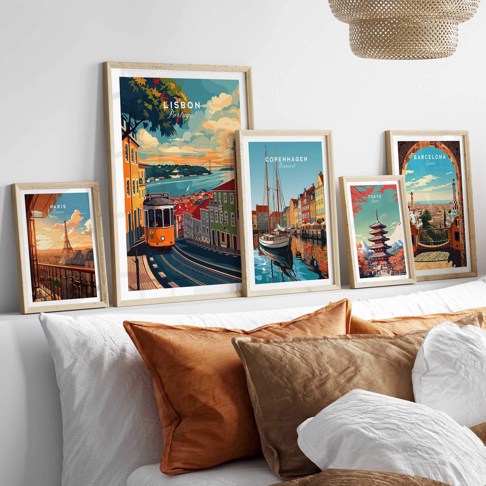 Lisbon Travel Print displayed among other city prints, showcasing vibrant colors and iconic landmarks of Lisbon.