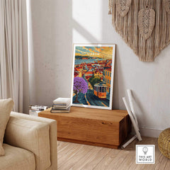 Lisbon Wall Art Poster featuring Jacaranda trees and Tram 28 in a stylish living room decor setting.