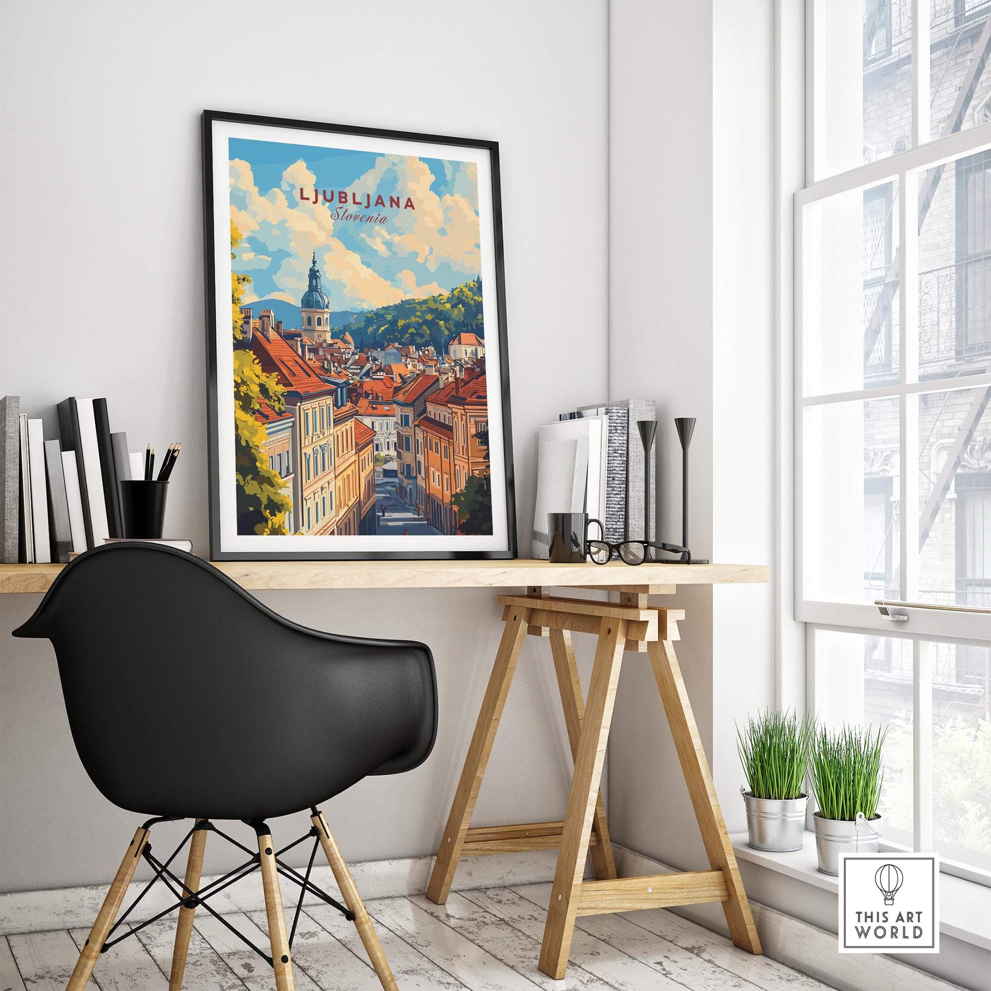 Ljubljana Travel Print framed art piece displayed in a modern workspace with a black chair and natural light.