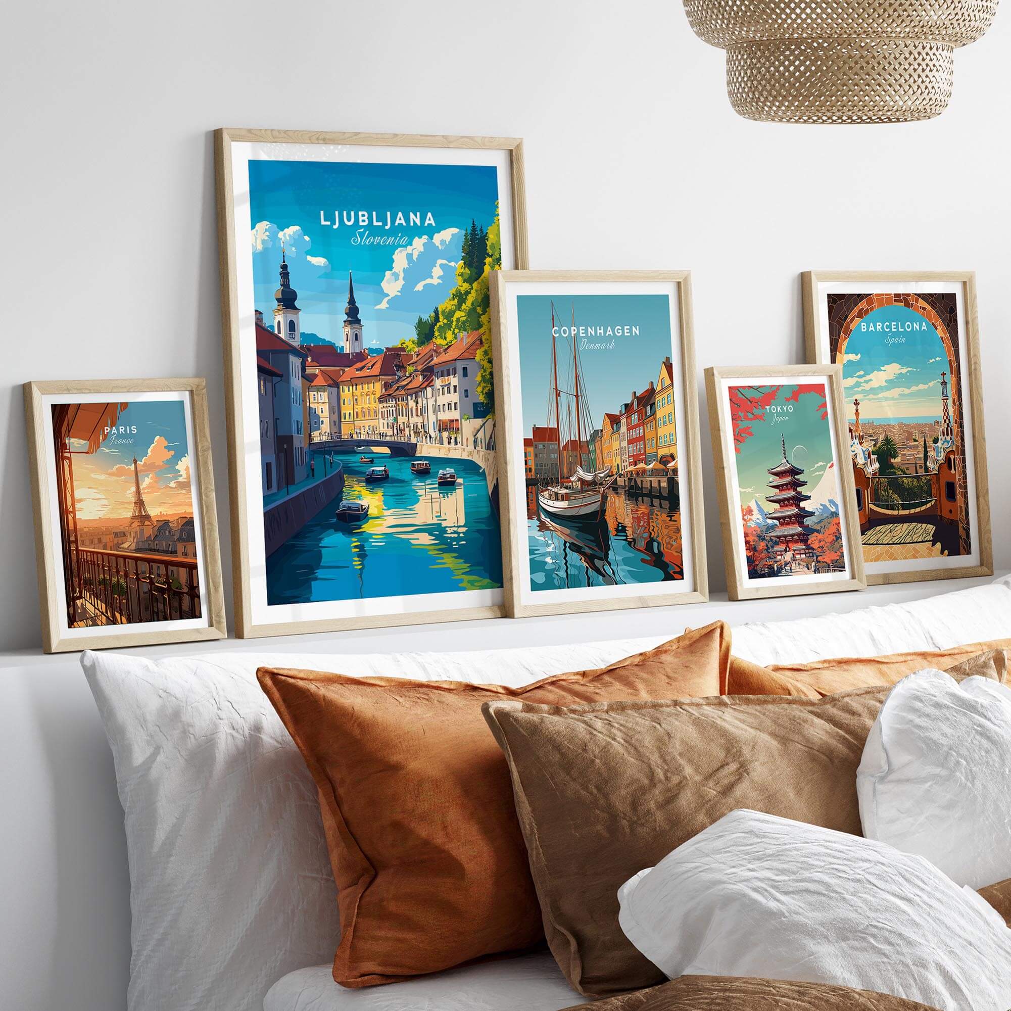 Ljubljana Wall Art display featuring vibrant travel posters of Ljubljana and other cities in stylish frames.