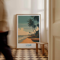 Lomé Togo Canvas Print | Palm Trees & Ocean View Poster displayed in a cozy room with a person walking by.
