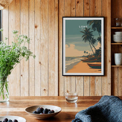 Lomé Togo Travel Poster | Sunset Shoreline Wall Art Print displayed in a cozy interior setting.