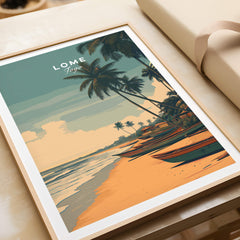 Lomé Togo Travel Poster | Sunset Shoreline Wall Art Print featuring traditional boats and palm trees at sunset.
