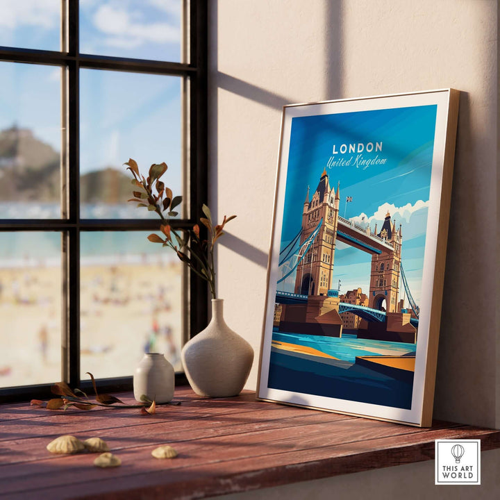 London Print England featuring Tower Bridge and River Thames, displayed on a windowsill with decor items.