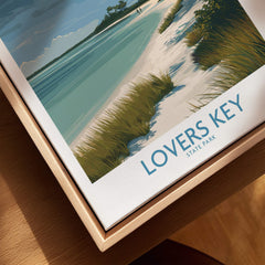 Lovers Key Florida Canvas Print | Tropical Beachfront Scenery Poster in a wooden frame on a table.