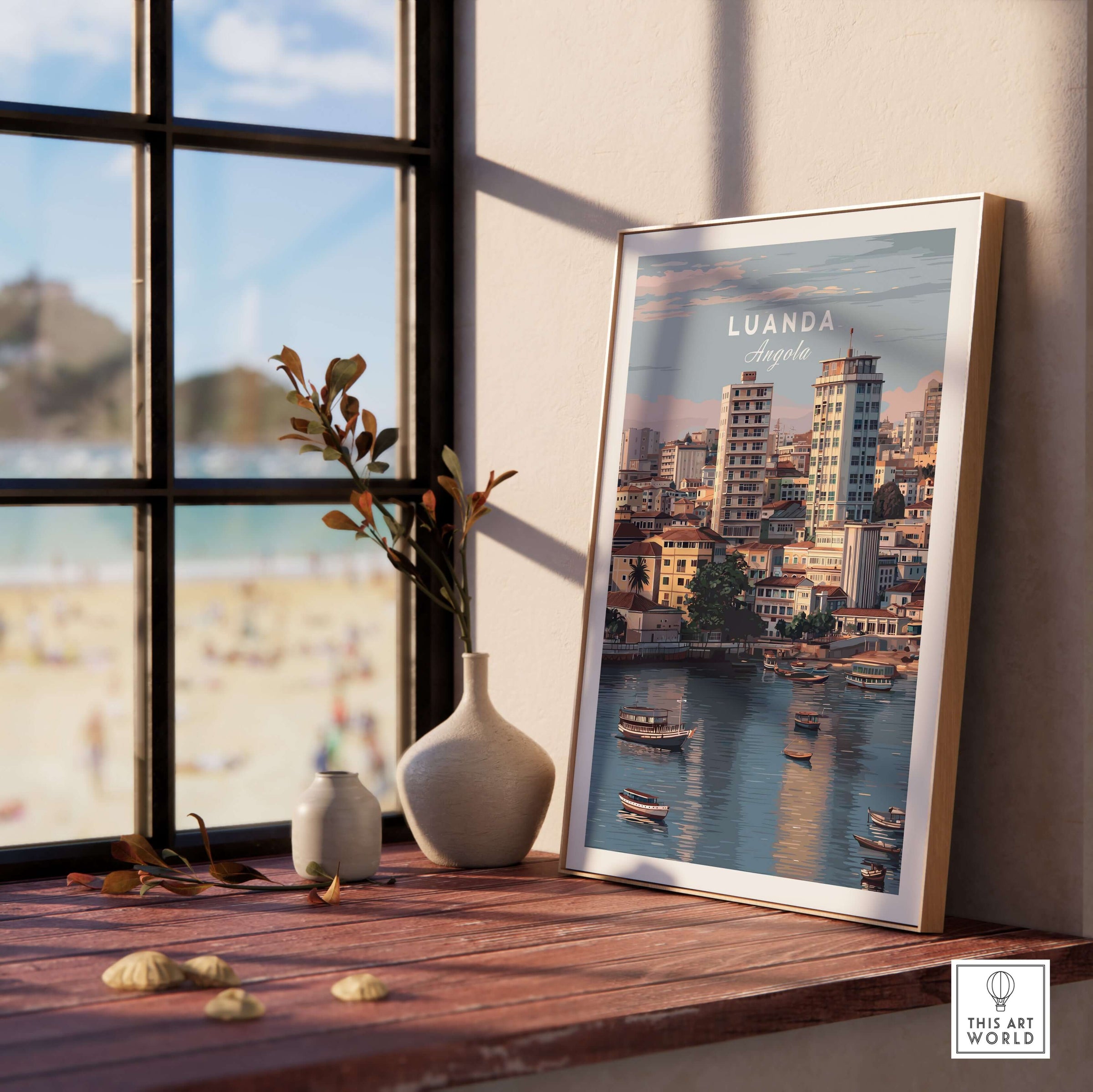 Luanda Art Print - African City Poster - Kwanza River Boats Wall Decor displayed on a wooden table by a window.