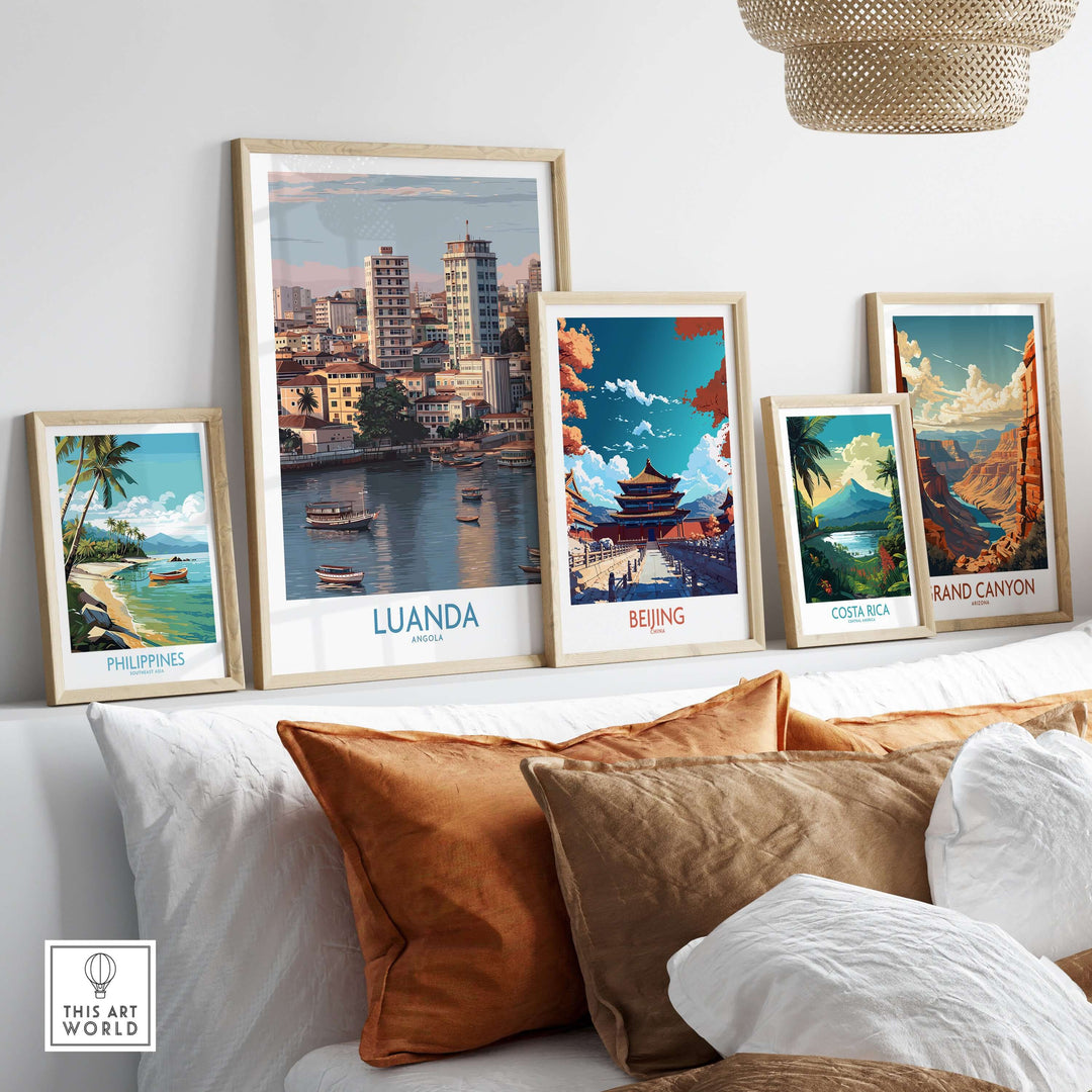Collection of framed travel posters featuring Luanda, Beijing, Costa Rica, and Grand Canyon on a stylish wall.