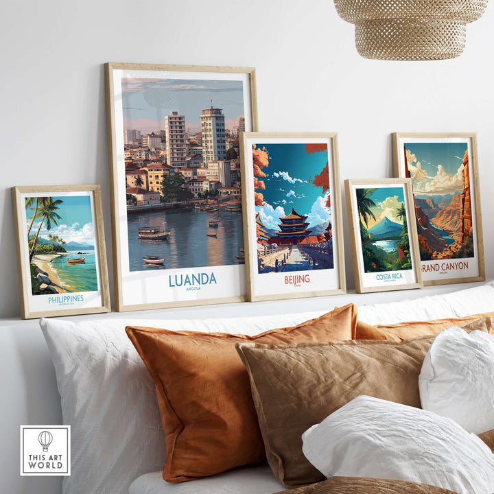 Collection of framed travel posters featuring Luanda, Beijing, Costa Rica, and Grand Canyon on a stylish wall.