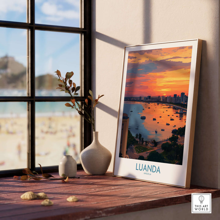 Luanda sunset cityscape art print displayed in a sunlit room, showcasing vibrant colors over Angola Bay.