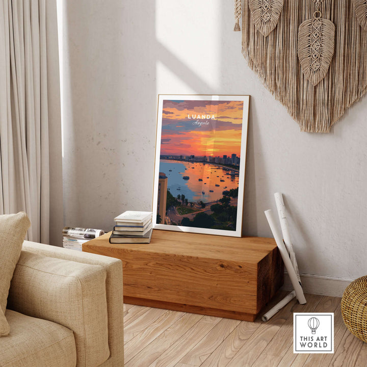 Luanda skyline at sunset poster displayed in a cozy living room setting with natural elements.