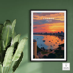 Luanda Skyline at Sunset Poster - Angola City Travel Print - Waterfront Wall Art framed on a green wall with tropical plants.