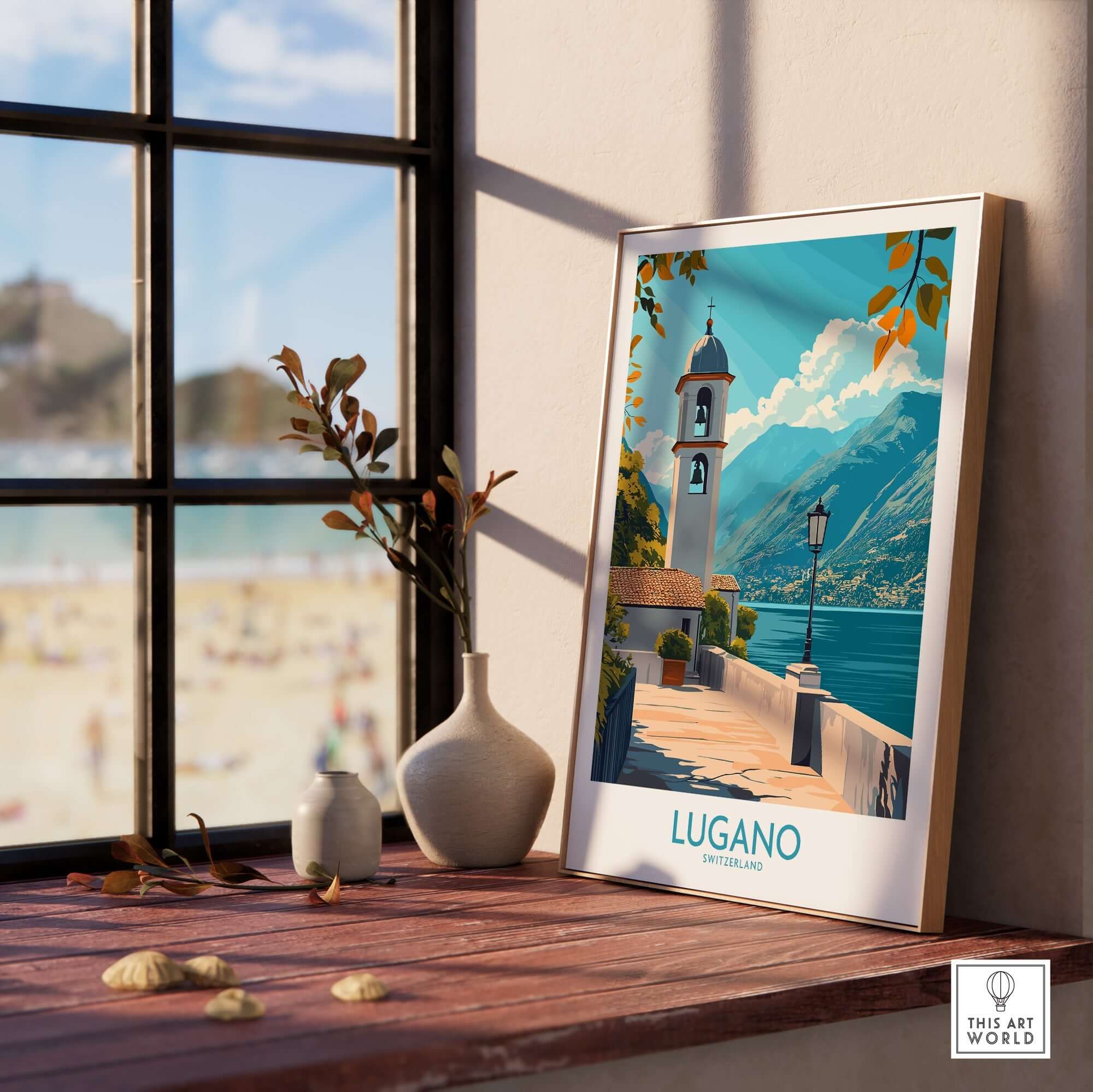 Lugano Art Print showcasing a scenic view of Lugano, Switzerland, displayed on a wooden table next to a vase.