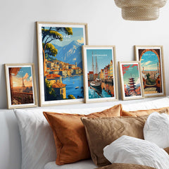 Lugano Travel Print displayed among other travel posters in a stylish home decor setting.