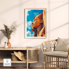Luxor Egypt Poster featuring a vibrant depiction of a famous statue against a blue sky in a stylish room.