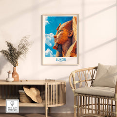 Luxor Egypt Travel Poster displayed on a wall above a stylish chair, showcasing Egyptian landmarks.