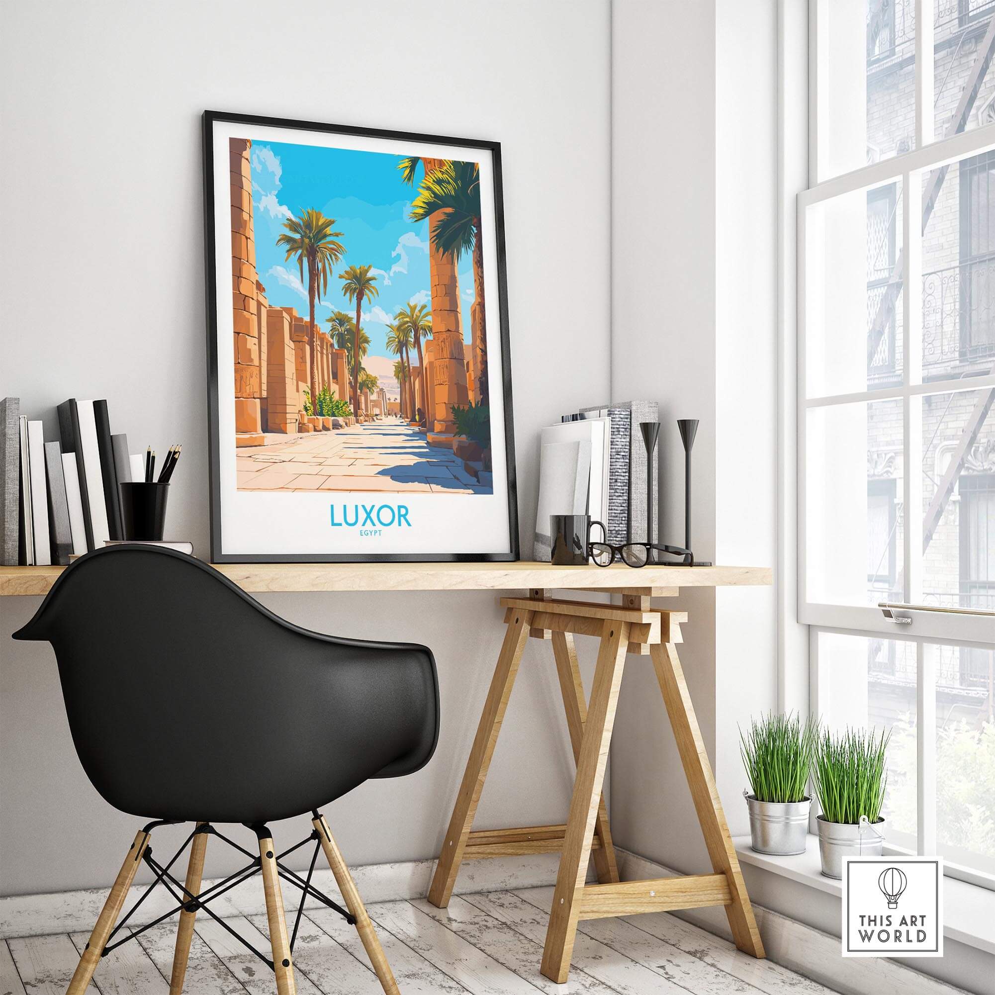 Luxor Travel Poster displayed in a stylish workspace, showcasing ancient Egyptian architecture and vibrant colors.