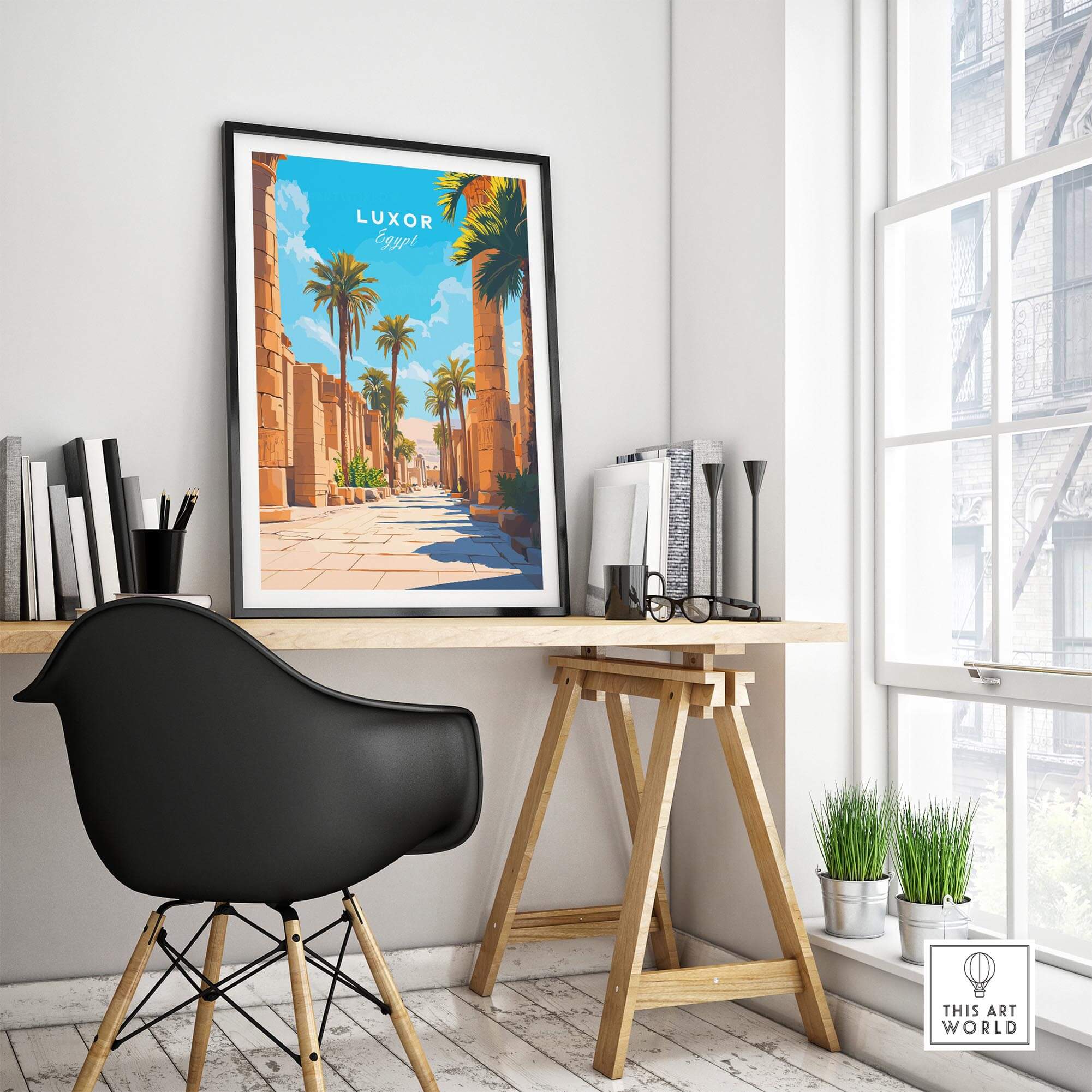 Luxor Travel Print showcasing ancient Egyptian architecture and palm trees in a modern workspace.