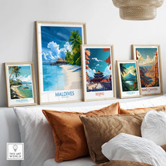 Maldives Wall Art Print - Tropical Beach showcased among other travel-themed prints on a stylish sofa.