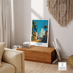 Maputo Travel Poster Mozambique displayed in a stylish living room setting, showcasing vibrant colors and scenery.
