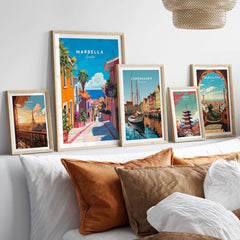 Marbella Poster showcasing a vibrant street view of Marbella, framed among other city posters in a stylish room.