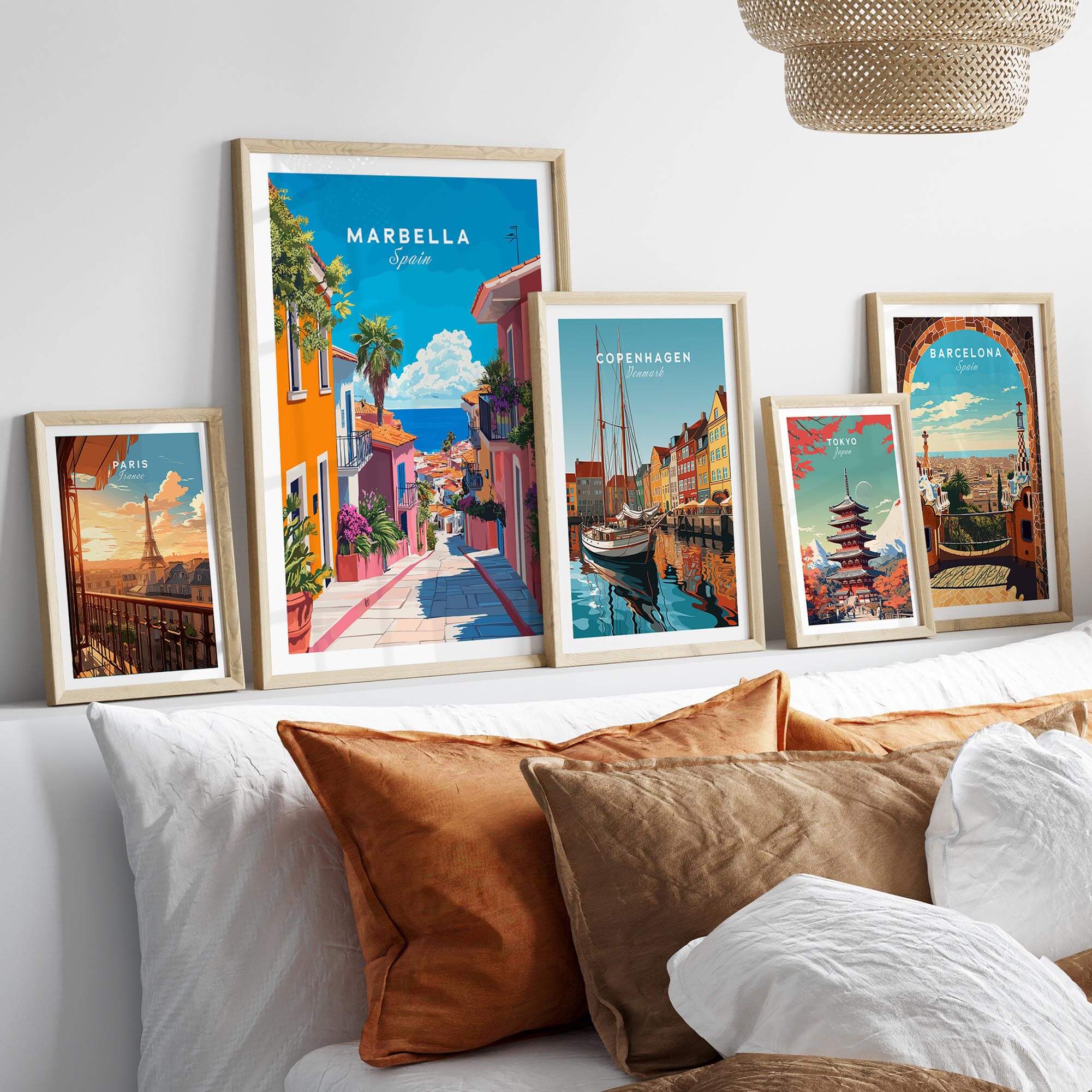 Marbella Poster showcasing a vibrant street view of Marbella, framed among other city posters in a stylish room.